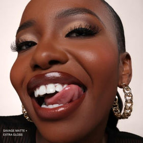 The Lip Bar Savage layered with gloss showing buildable shine option