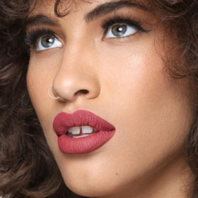 The Lip Bar with Juicy Pout Duo staged to show ideal lip prep pairing
