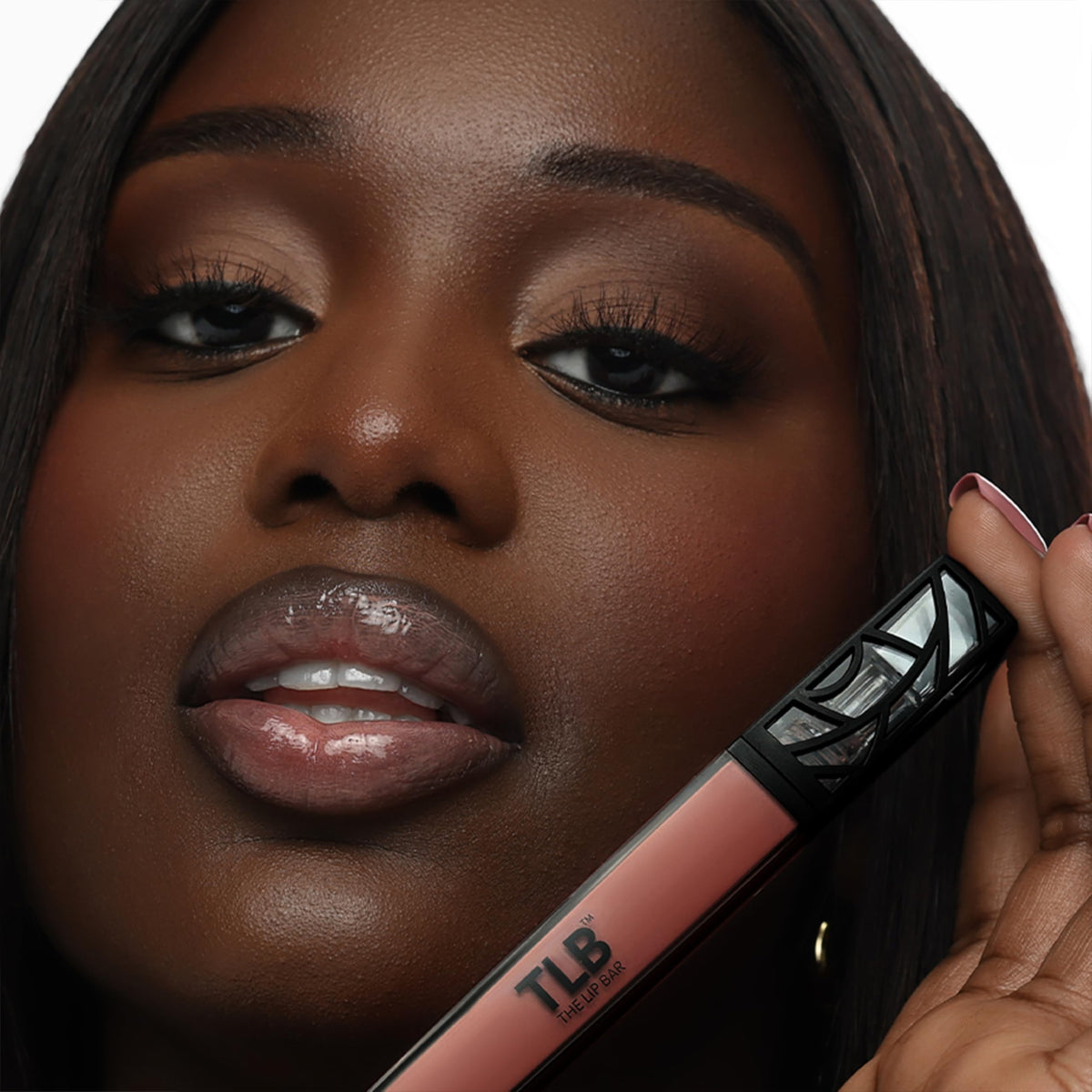 Close-up of The Lip Bar gloss texture highlighting shimmer and non-sticky finish