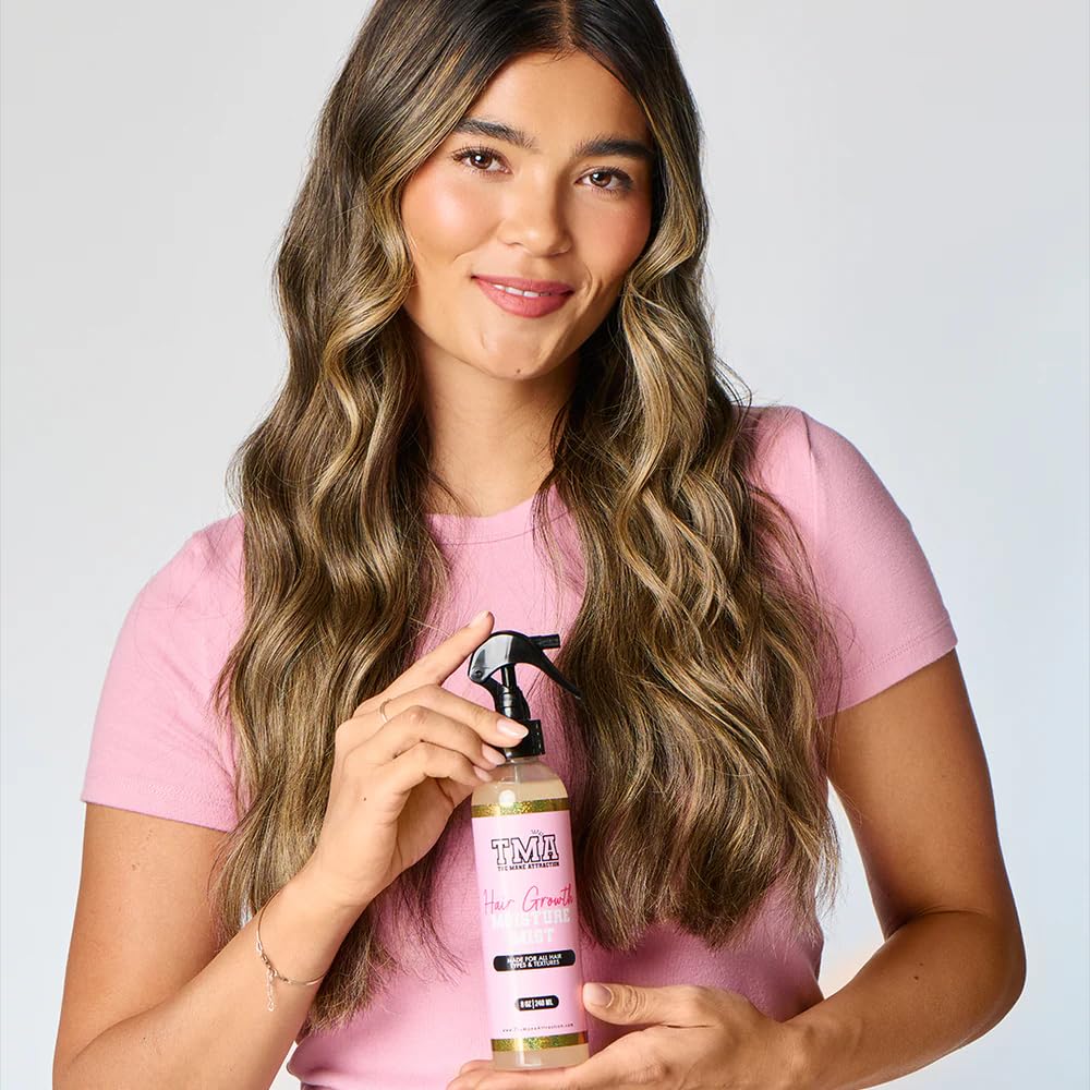 The Mane Attraction bottle in hand illustrating 8 fl oz size for scale and convenience