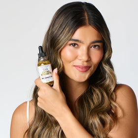 The Mane Attraction oil texture close-up showing lightweight, fast-absorbing finish