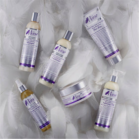 Hand holding The Mane Choice 8 oz bottle to show Heavenly Halo size and portability
