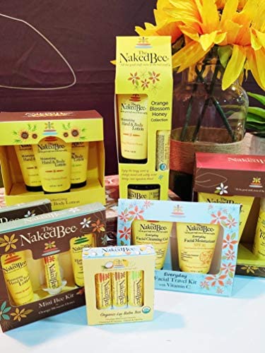 The Naked Bee Orange Blossom bottle close-up highlights scent and moisturizing benefits