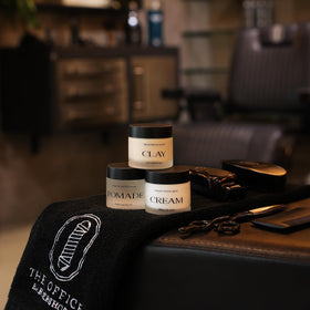 THE OFFICE BARBERSHOPS jar with barber tools implying professional use