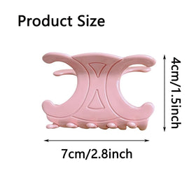 The Only One clip held in hand to show medium size and comfortable everyday use