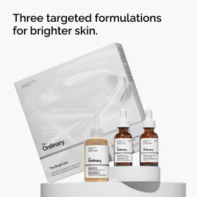The Ordinary alpha arbutin serum pipette dispensing precise drop, brightening benefit