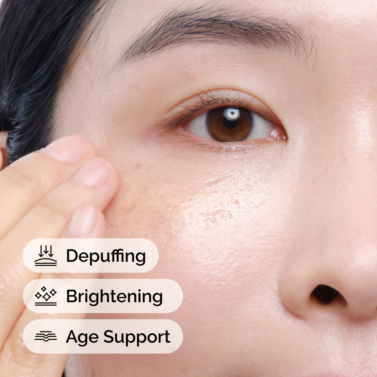 The Ordinary being applied to eye contour, demonstrating gentle patting for reduced puffiness