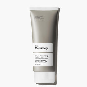 The Ordinary Natural Moisturizing Factors Hyaluronic Acid jar open showing creamy texture and barrier support