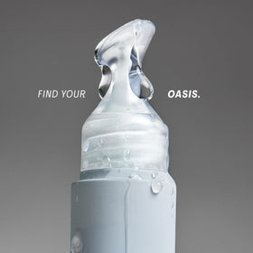 The Outset tube in hand displaying compact 0.3 oz size for portability