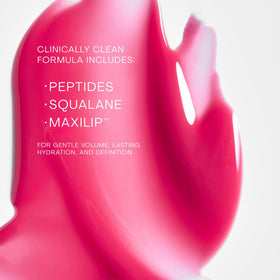 The Outset Lip Oasis held in hand for size comparison and portable convenience