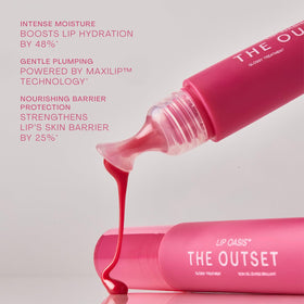 Swatch of The Outset Daiquiri on lips showing sheer pink tint and polished shine