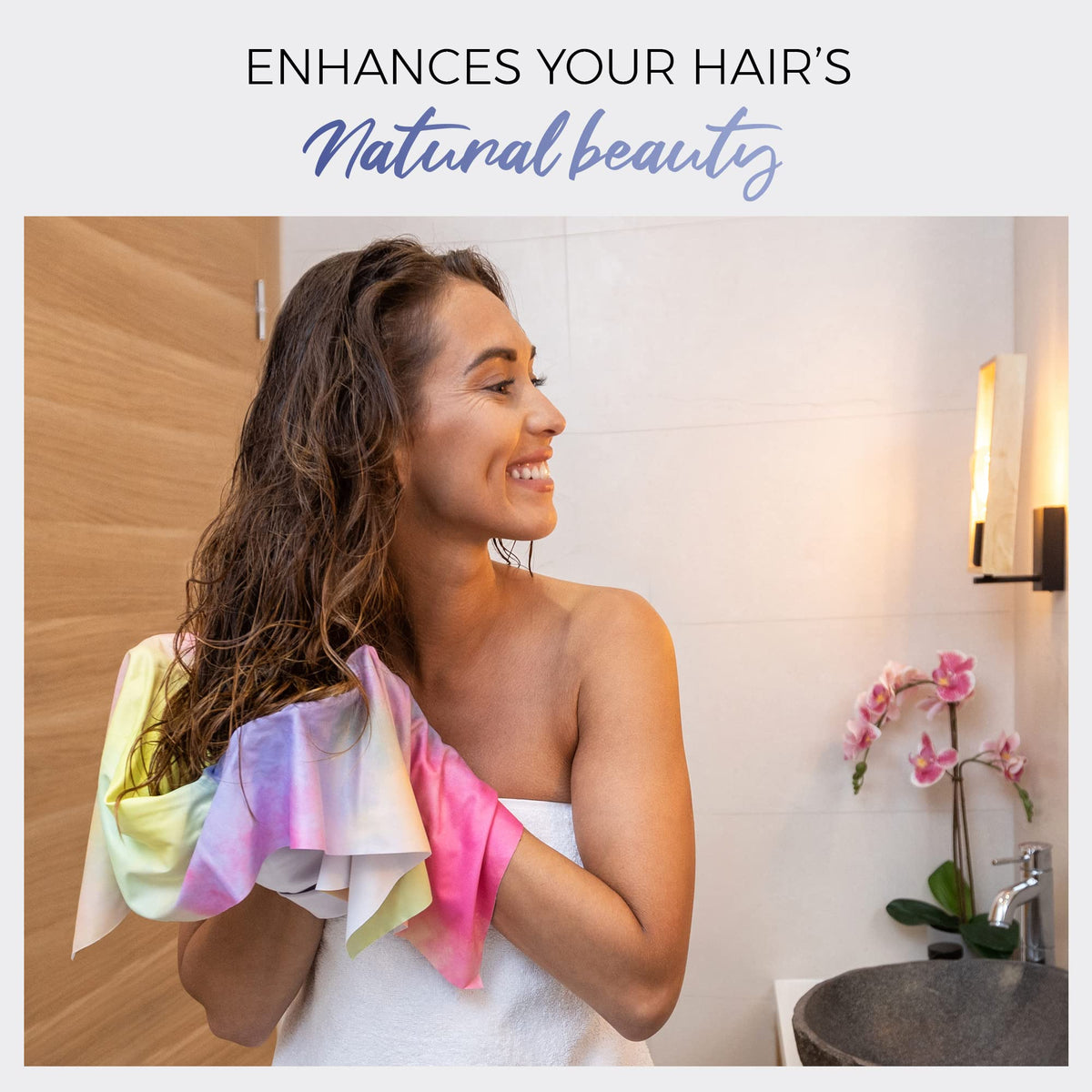 THE PERFECT HAIRCARE towel next to hand to show oversized fit and coverage