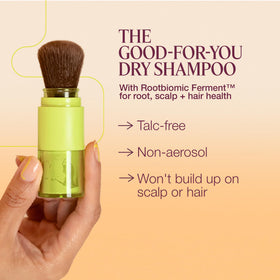 THE ROOTIST brush close-up applying powder to roots for precise oil control