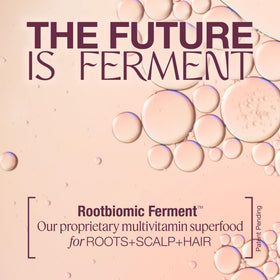 THE ROOTIST travel-sized tube in handbag for on-the-go freshness and lift