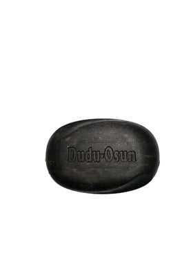 The Roots Naturelle close-up of black soap texture highlighting natural ingredient appeal