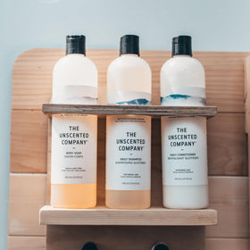 The Unscented Company bottle beside refill pack showing eco-friendly refill option