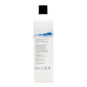 The Unscented Company conditioner texture pouring, shows smooth consistency