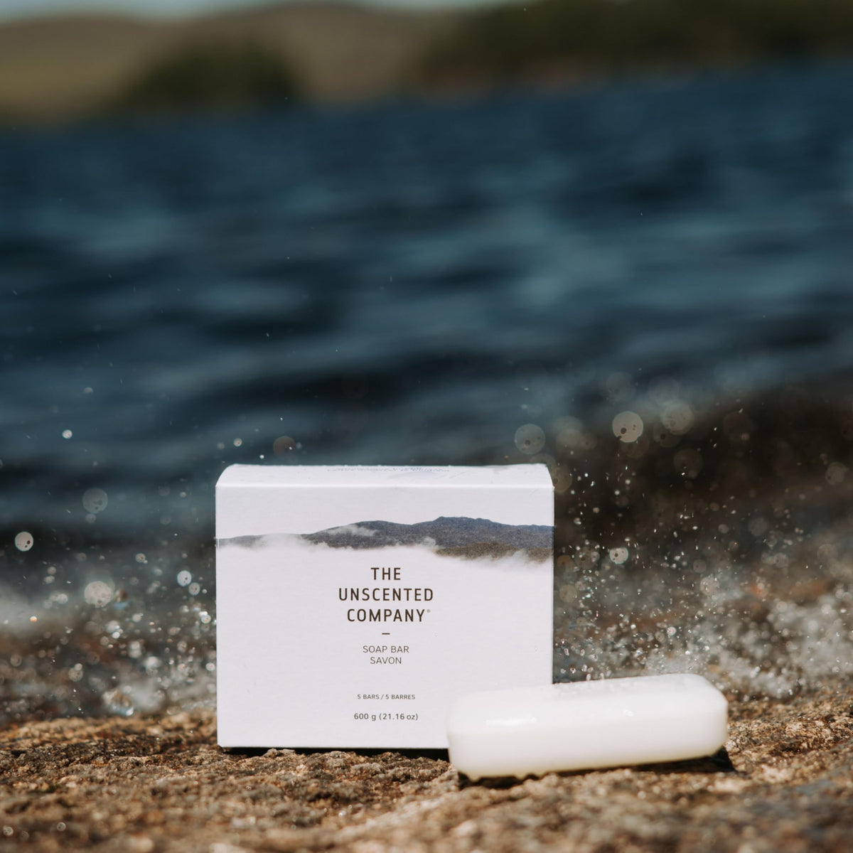 The Unscented Company soap bar in shower scene demonstrating fragrance-free everyday use