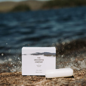 The Unscented Company soap bar in shower scene demonstrating fragrance-free everyday use