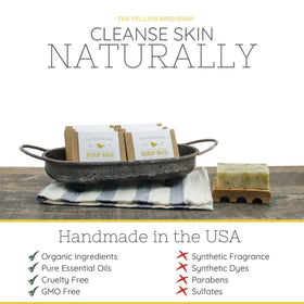 The Yellow Bird soap in a shower lifestyle scene suggesting calming scent and daily routine boost