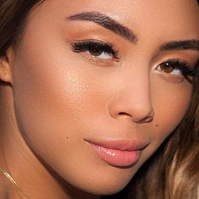theBalm applied on model cheeks demonstrating natural glow and long-lasting wear benefit