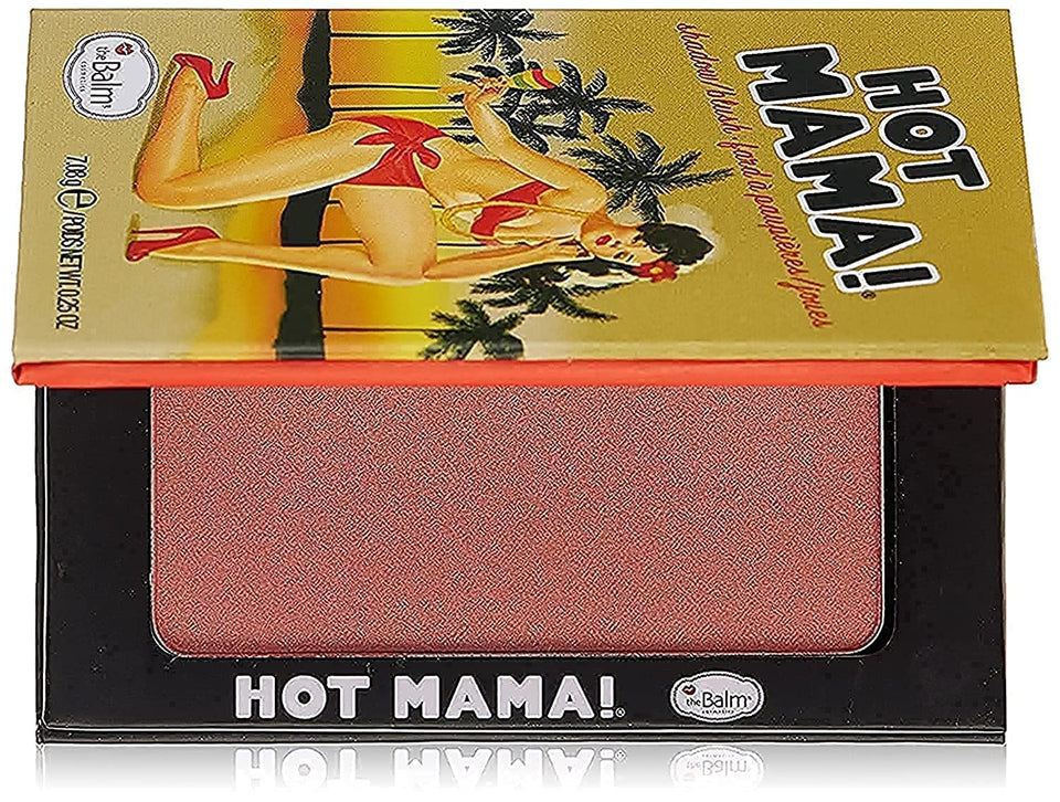 theBalm compact front view showing peachy-pink shade and travel-ready design