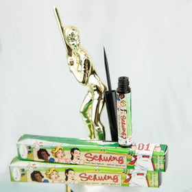 theBalm Schwing beside a ruler showing compact 0.05 fl oz size
