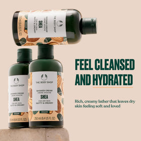 The Body Shop shea shower cream lather in hand demonstrating gentle cleansing benefit