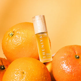 Theniya in-hand travel shot illustrating portable cuticle care benefit