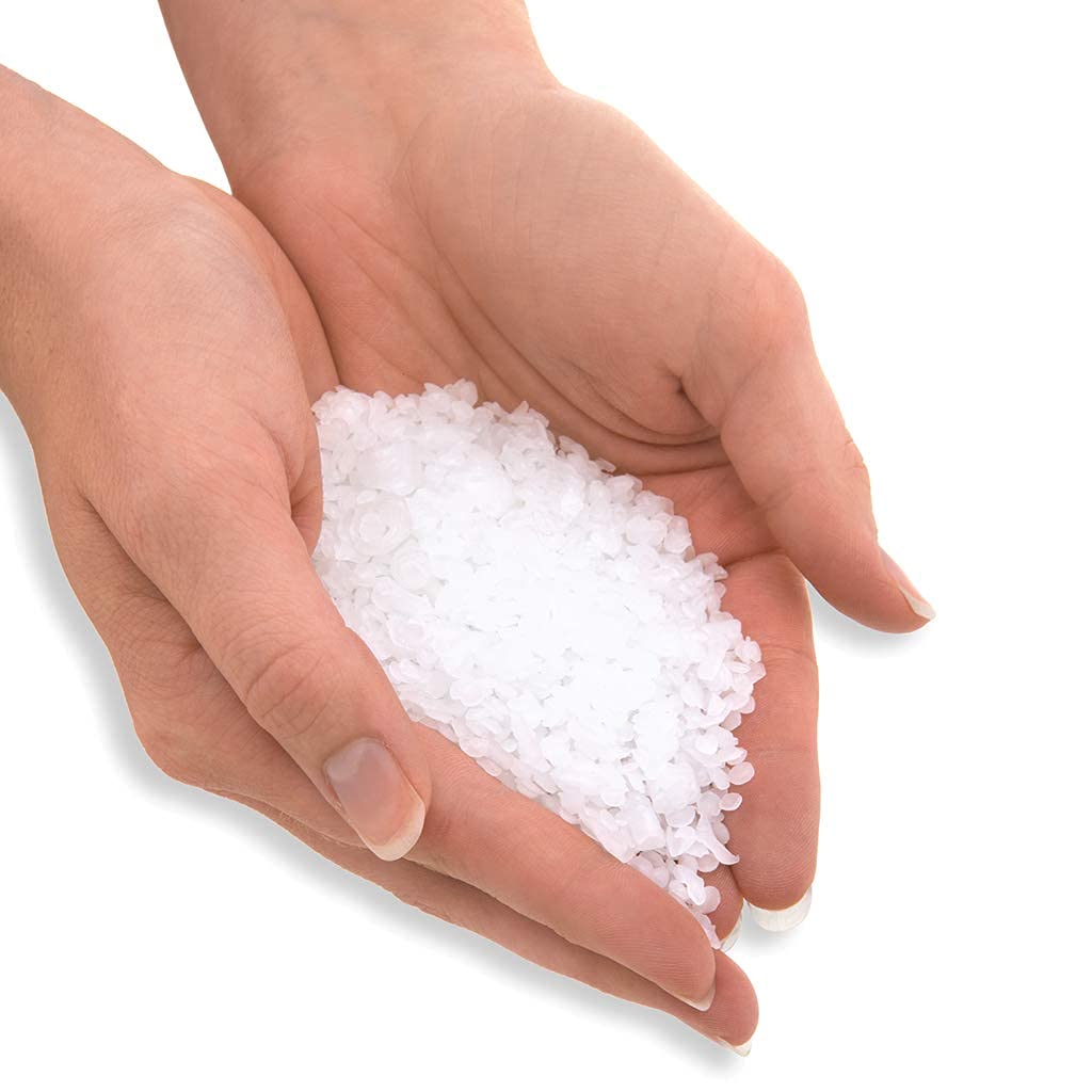 Therabath peeled wax glove in hand showing easy, residue-free removal