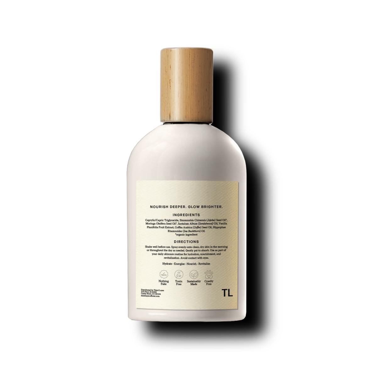 Third Layer glass bottle detail with reflection, emphasizes premium glass packaging
