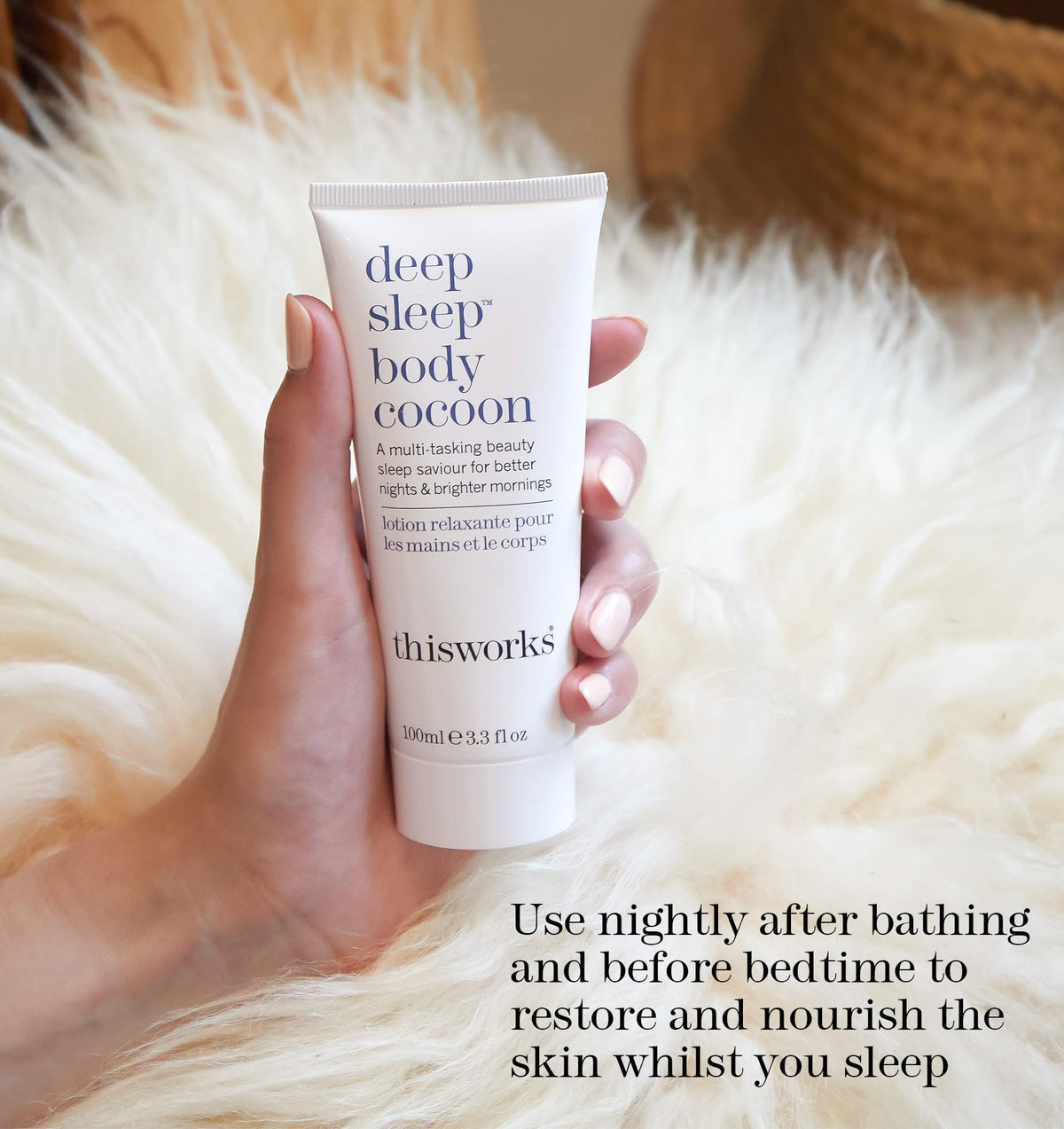 THISWORKS tube on bedside table next to lamp, visualizes nighttime routine convenience