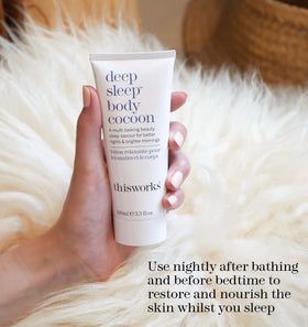 THISWORKS tube on bedside table next to lamp, visualizes nighttime routine convenience