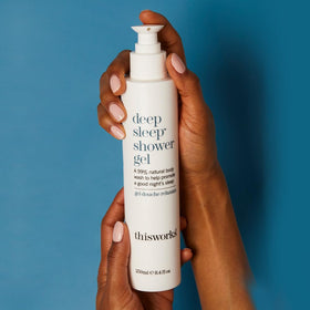 THISWORKS shower gel poured into a bath creating relaxing soak