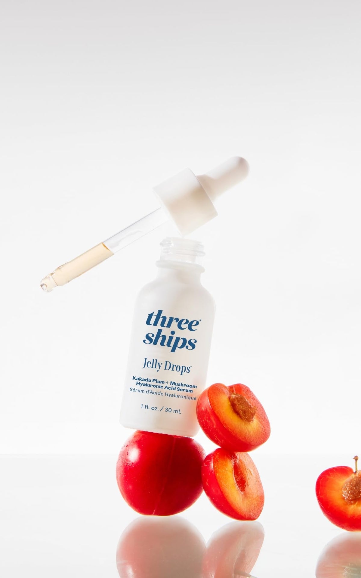 Three Ships applying serum to skin demonstrating instant hydration benefit