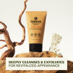 Thrive Natural Care ingredient flatlay highlighting citrus and plant actives