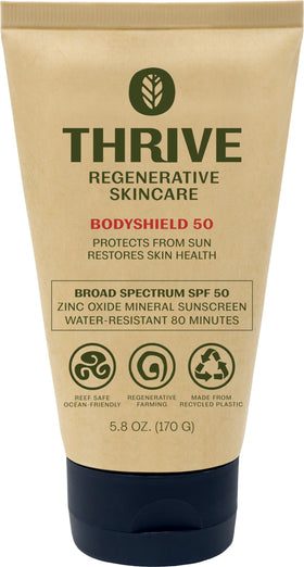 Thrive Natural Care front packaging showing SPF50 and reef safe benefits