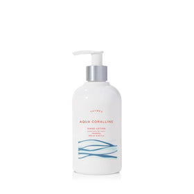 Thymes silver-pump bottle front view showing Aqua Coralline label and elegant design for easy dispensing