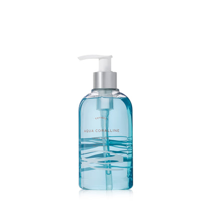 Thymes pump bottle front view showing Aqua Coralline scent and elegant design benefit