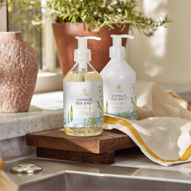 Thymes hand wash bottle staged on a bathroom counter enhancing sink decor benefit