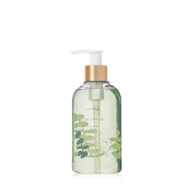 Thymes front packaging showing eucalyptus-scented 8.25 oz bottle and label benefits