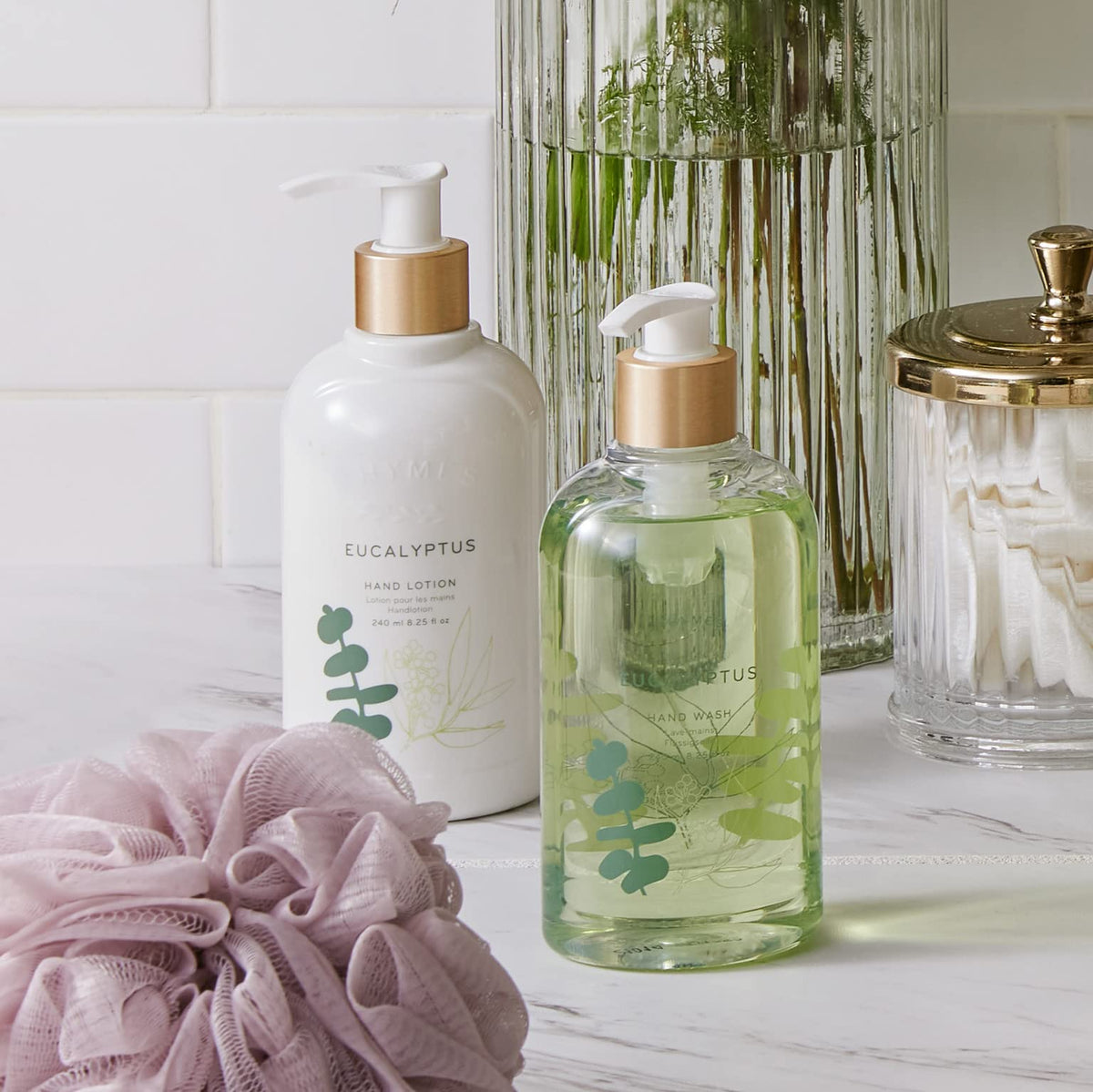 Thymes creamy lather texture on hands highlighting moisturizing glycerin and jojoba