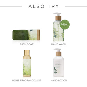 Thymes held in hand to show 3 fl oz travel-friendly size