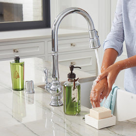 Thymes Frasier Fir bottle on sink staged to show countertop-ready convenience