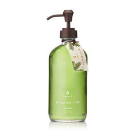 Thymes Frasier Fir bottle front view showing elegant packaging and nourishing benefits