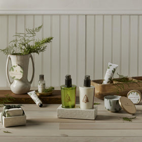 Thymes bottle styled on bathroom counter adding seasonal scent and decor