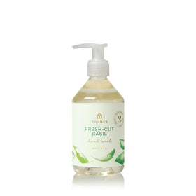 Thymes front packaging showing bottle and herbaceous basil scent benefits