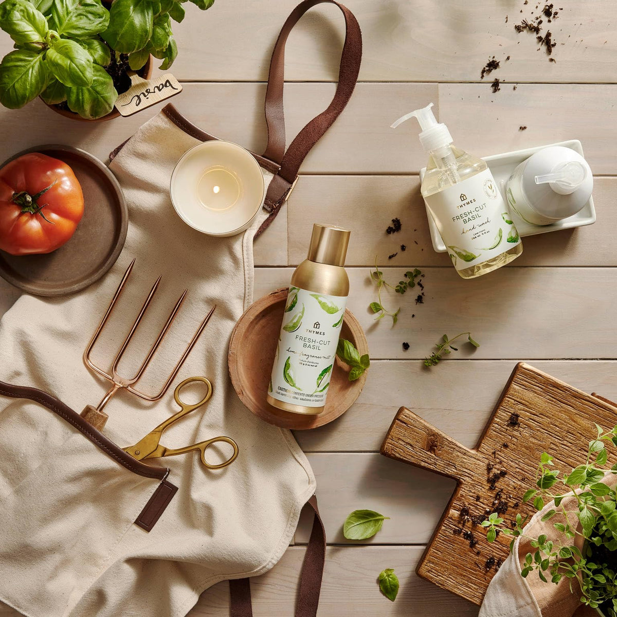 Thymes bottle next to hand for size comparison and countertop suitability