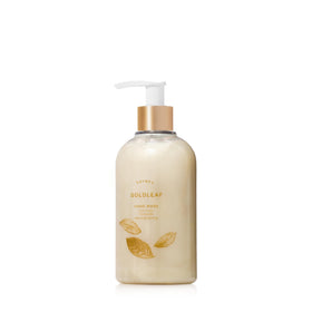 Thymes Goldleaf front pump bottle on counter showing elegant packaging and easy dispensing