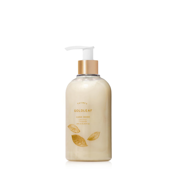 Thymes Goldleaf front pump bottle on counter showing elegant packaging and easy dispensing